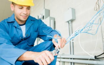 Electrician cutting wire